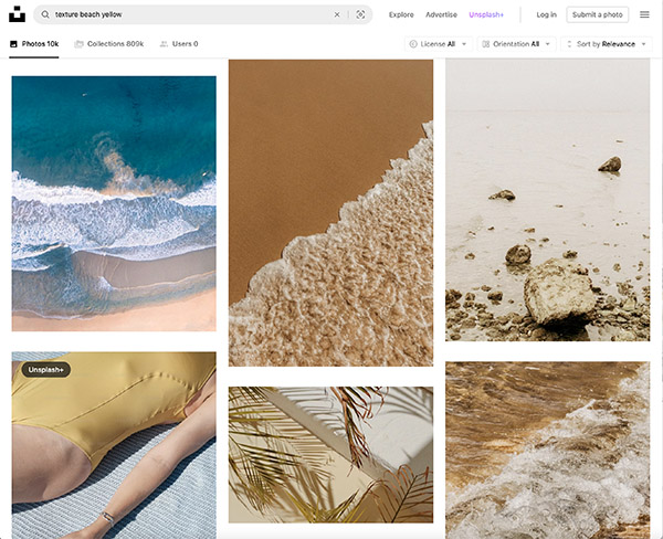 Unsplash image search that combines  the words texture beach and yellow.